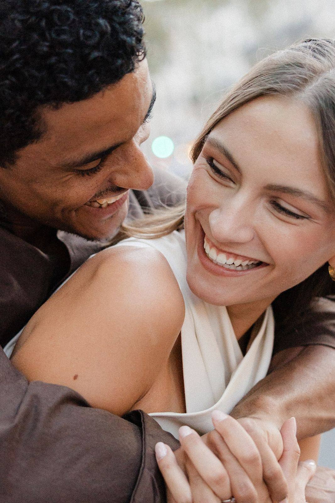 Close-up of a couple laughing