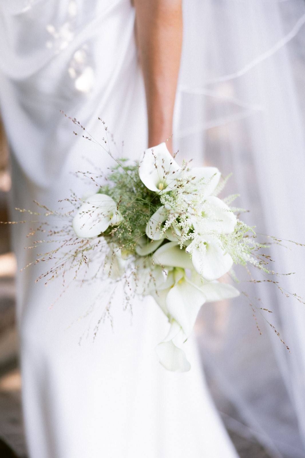 Bridal bouquet of white calla lilies