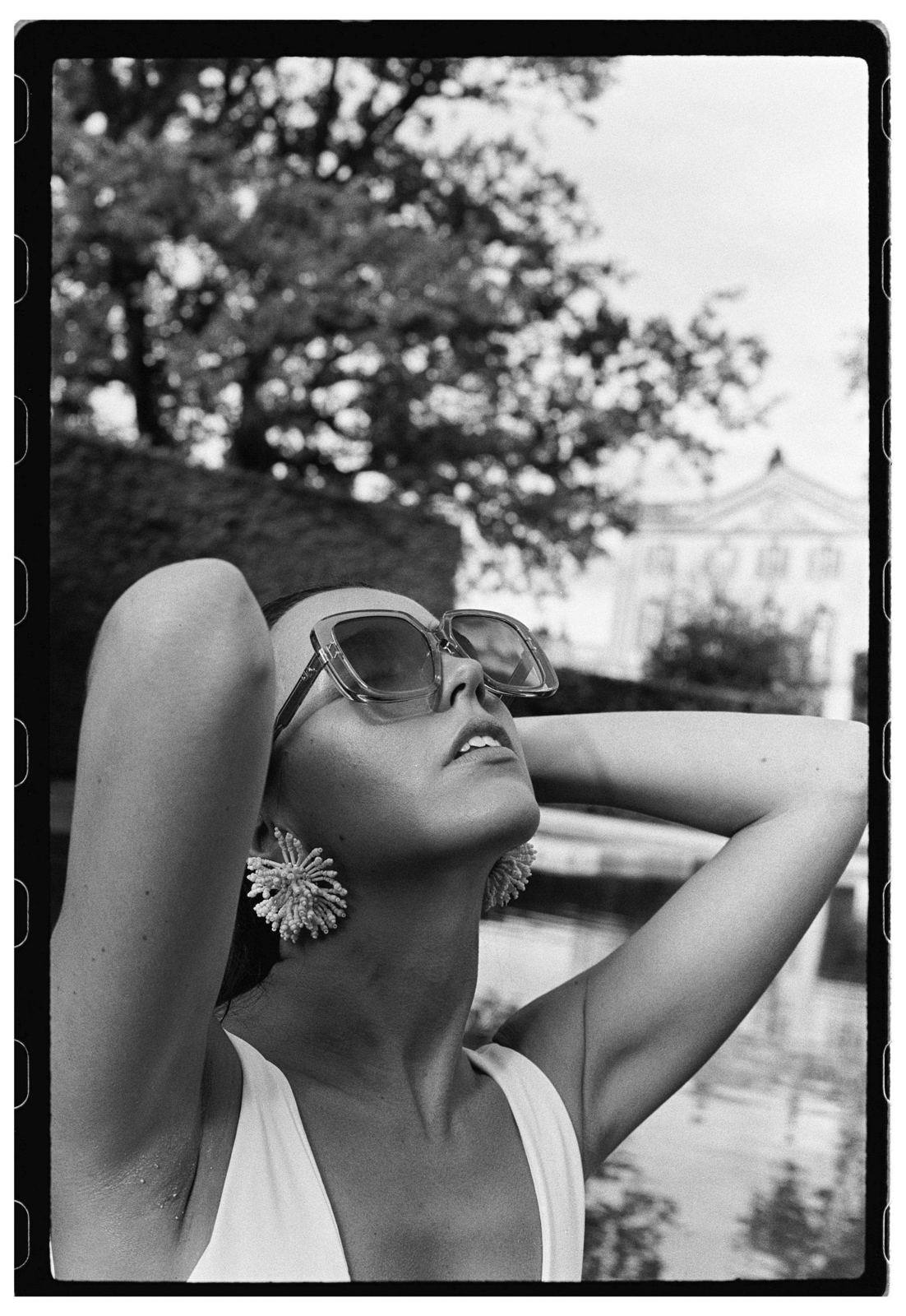 Wedding guest in sunglasses, shot on film